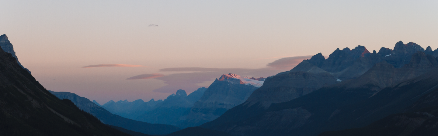 Sunset peeking through the mountains