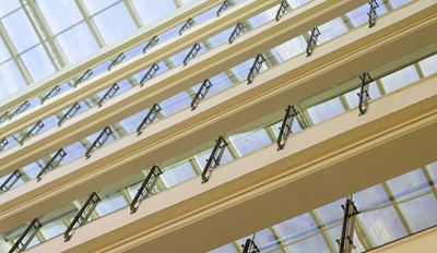 Glass atrium roof with window supports