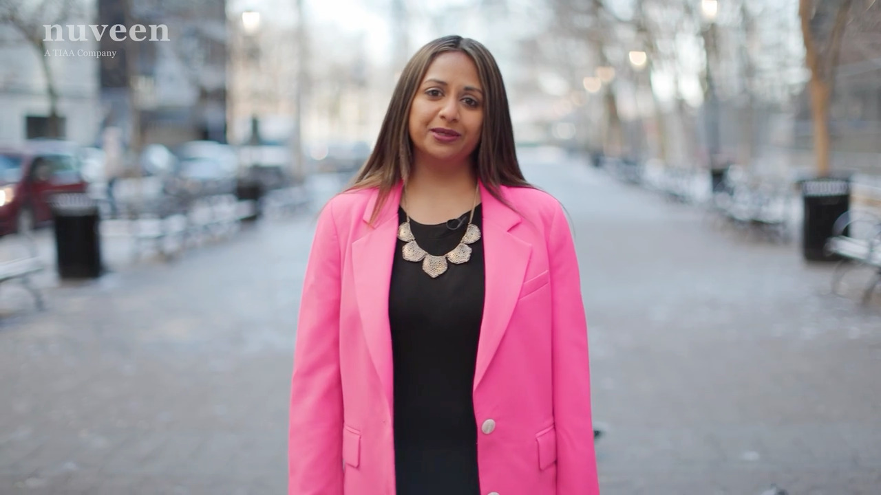 Woman in a pink blazer